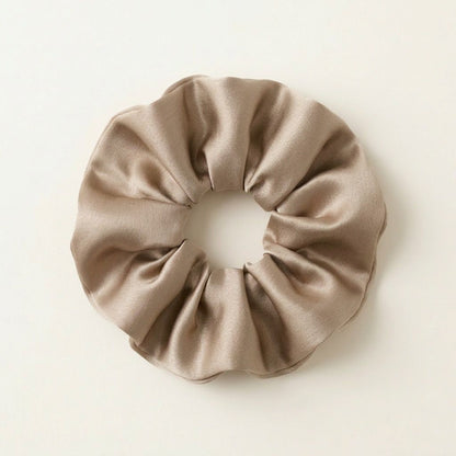 Velours Chignon – Le chignon qui tient, sans casser vos cheveux.